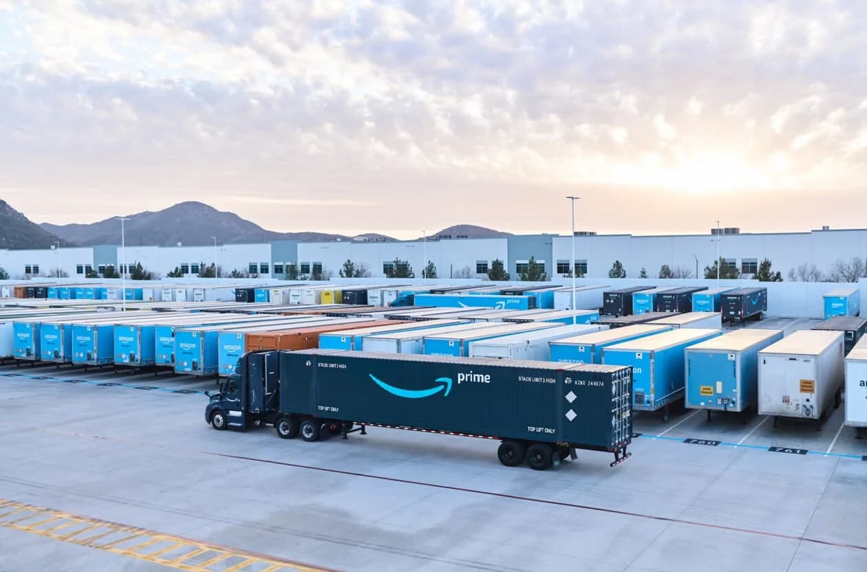 Amazon Supply Chain Services fleet of electric semis and warehouse robots feeding Tesla demand