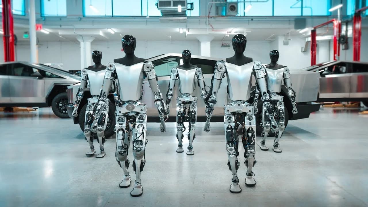 Tesla robotaxi and Optimus humanoid robot representing the Tesla robot economy replacing human labor