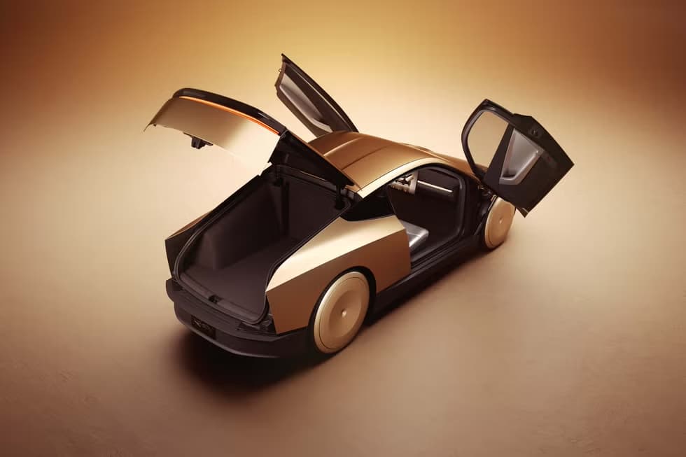 Tesla Cybercab steering wheel concept parked on a city street beside ride-hailing traffic
