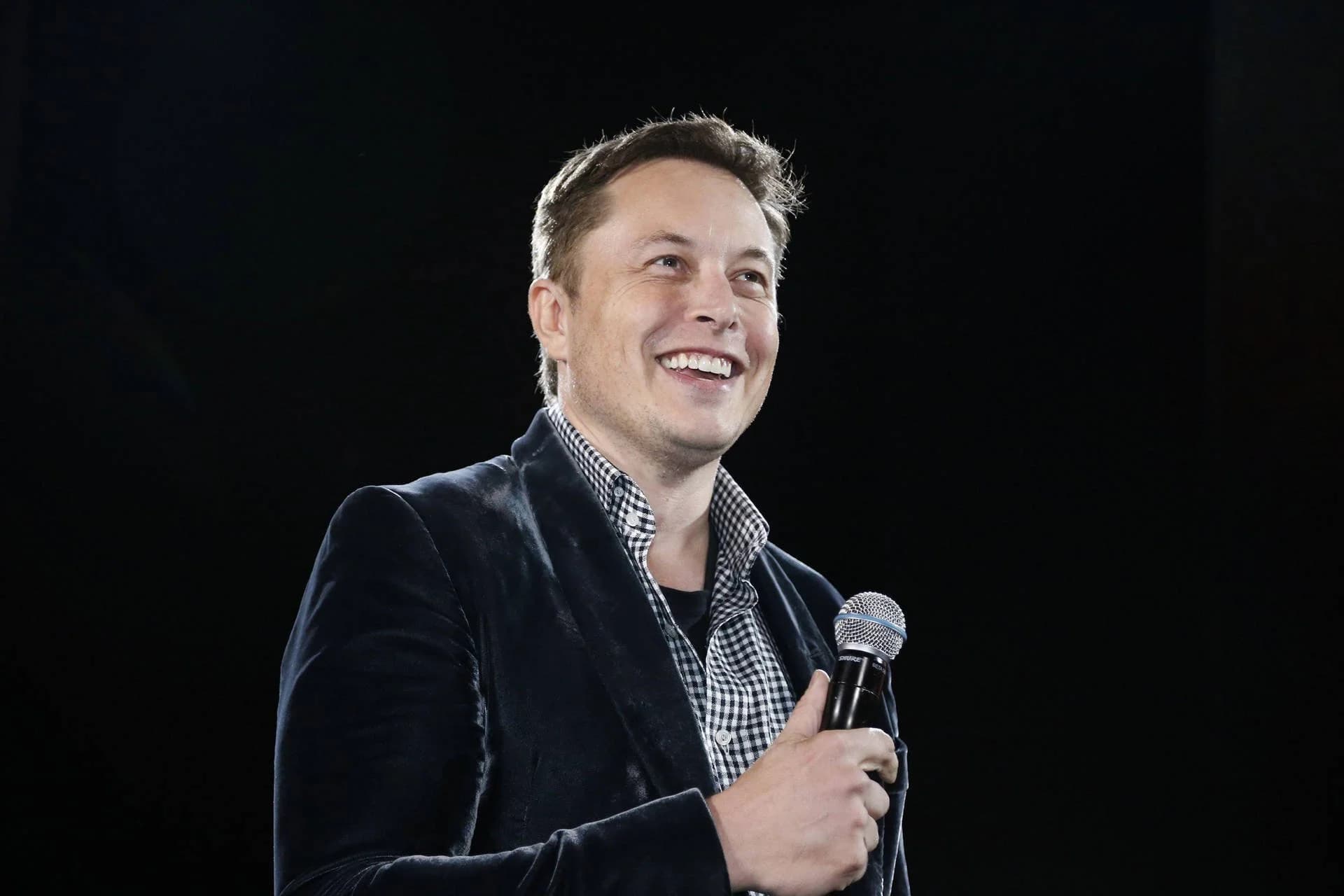 Elon Musk civilizational impact across Tesla, SpaceX, Neuralink and Optimus shown as one connected flywheel