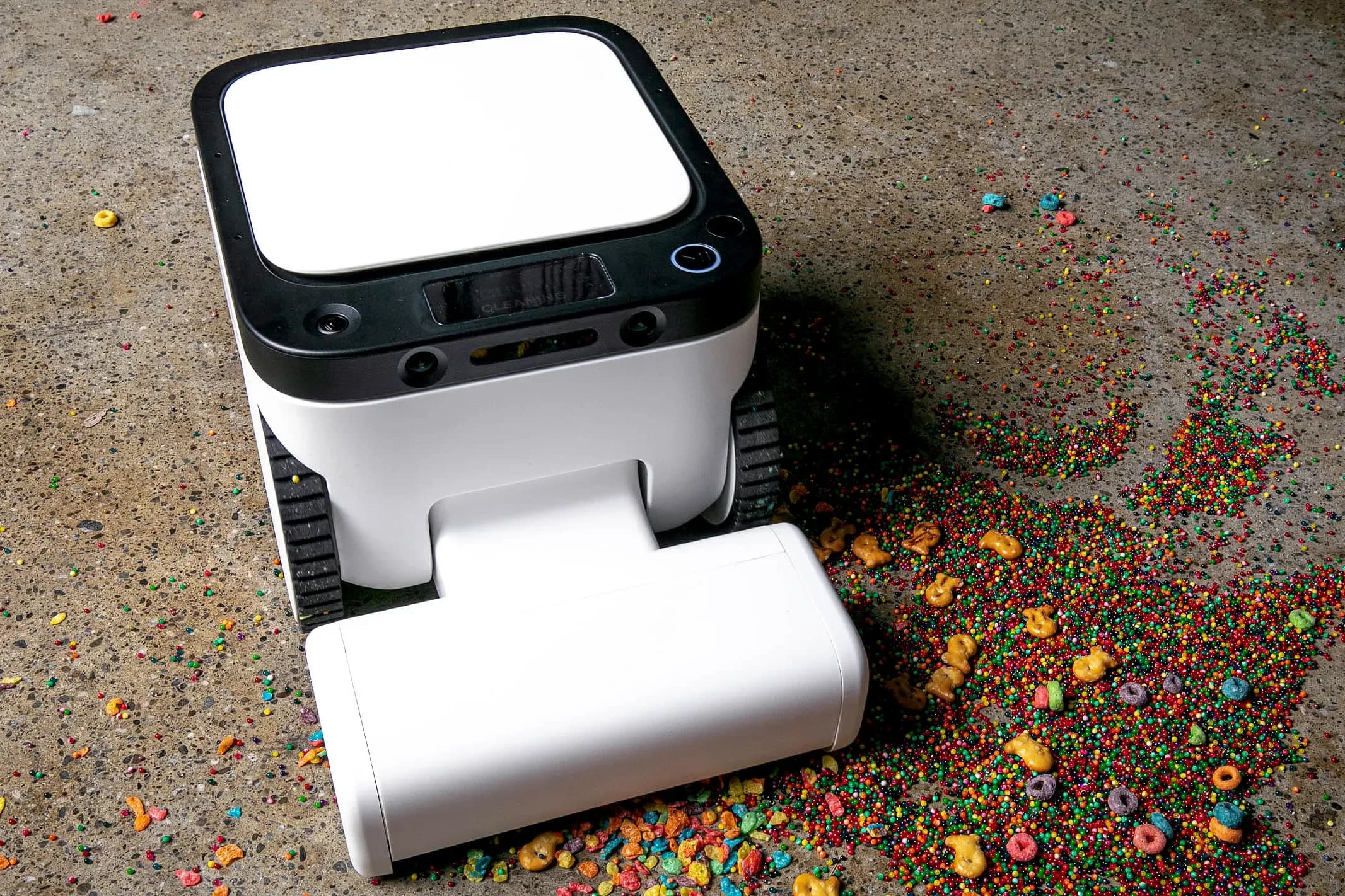 Matic robot vacuum with its five-camera vision system cleaning a home floor near its compact dock