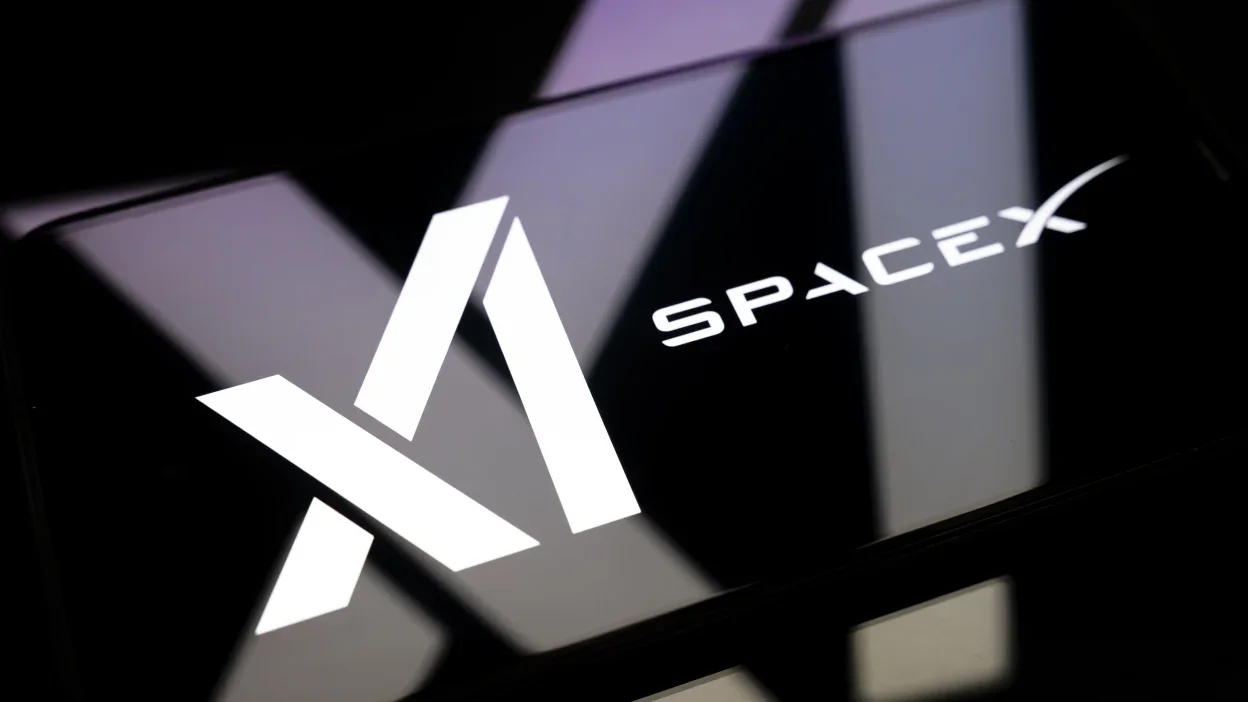 Elon Musk with SpaceX rocket and satellite AI network illustrating the SpaceX xAI merger