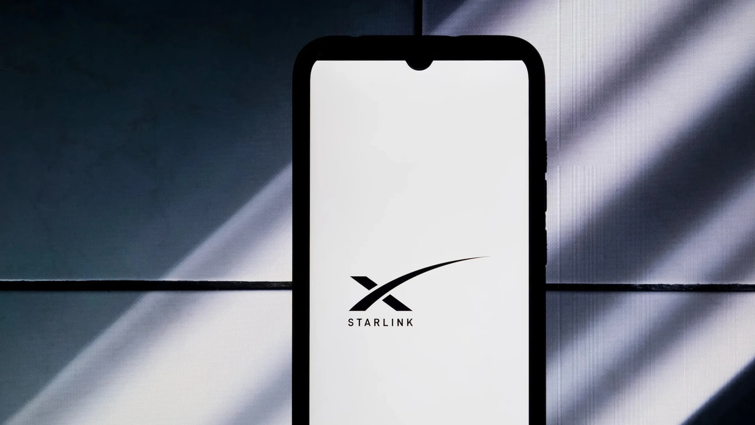 Starlink direct to phone satellite beaming signal to a standard cell phone in a remote dead zone