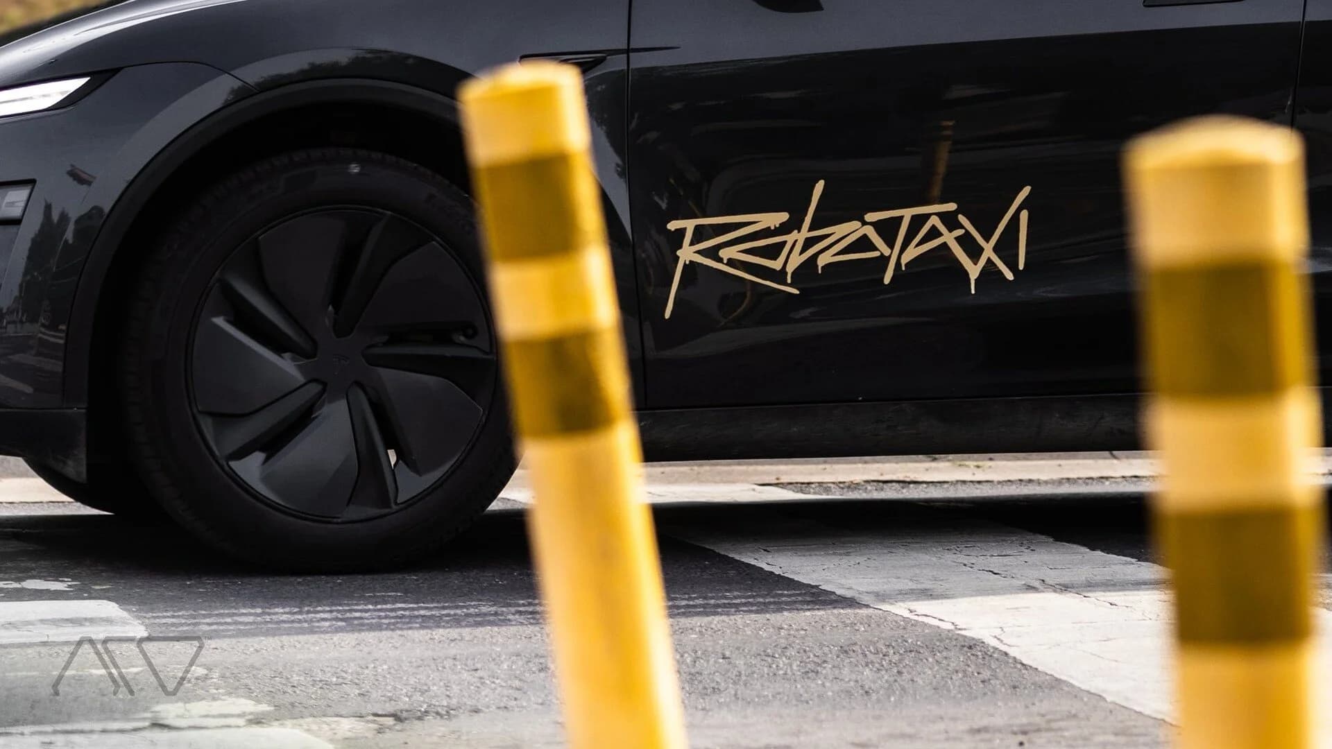 Tesla robotaxi driving autonomously through a city street, illustrating tesla robotaxi economics